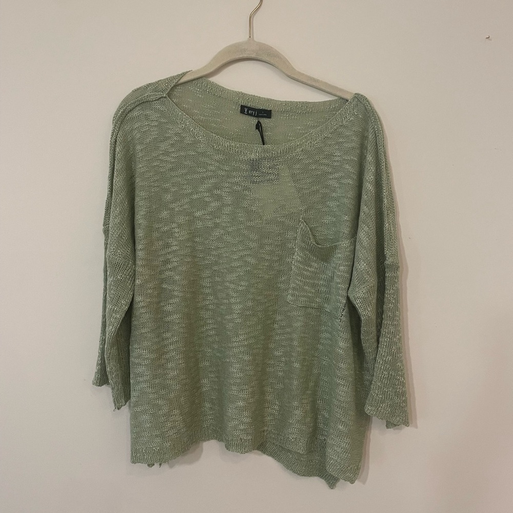 Lightweight summer sweater new with tags.